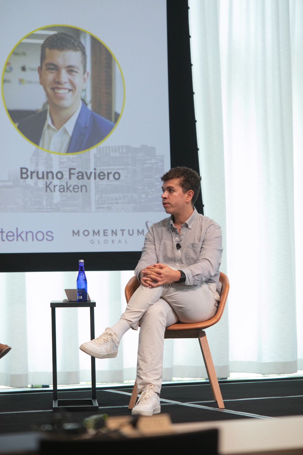 Bruno Faviero of Kraken seated on stage during the State of M&A panel at Web3 Investor Day 2026